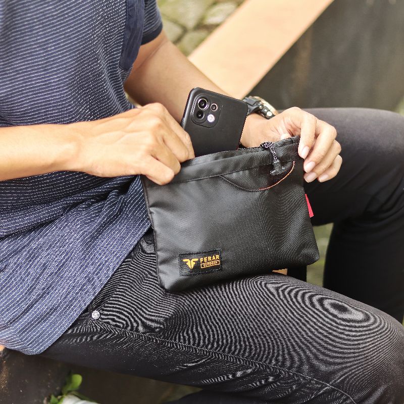 Handbag /Clucth bag pria wanita Anti air Ferar ZIGAS