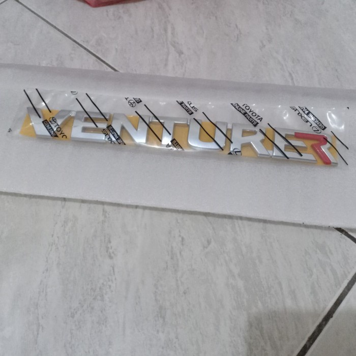 emblem tulisan VENTURER