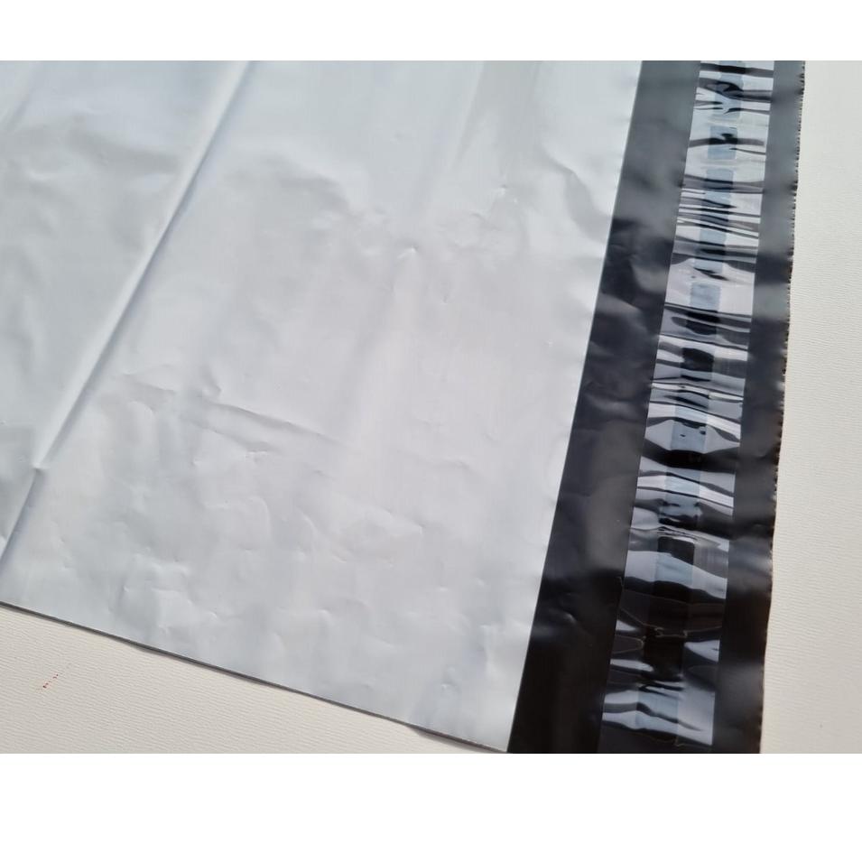 

Serba Baru POLYMAILER ±100PCS 20x30CM PUTIH PREMIUM GLOSSY PLASTIK POLYMAILER WHITE