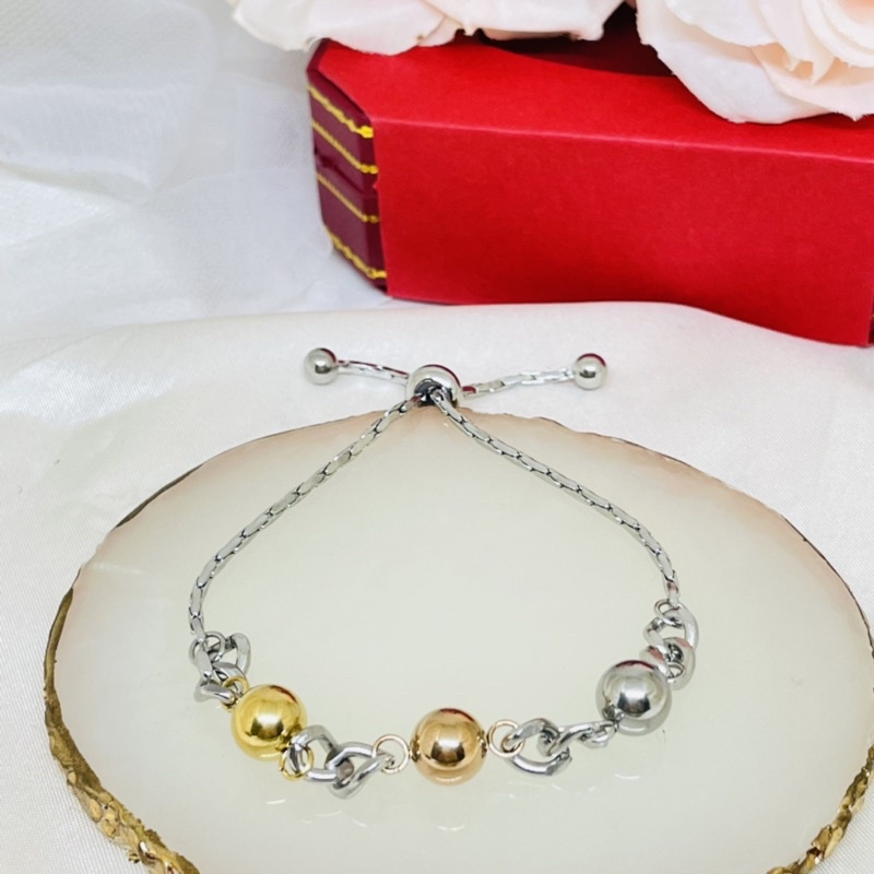 Gelang serut titanium bola combinasi wanita
