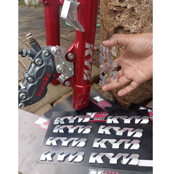 ヤ emblem shok 1set KYB stiker emblem logo 1set KYB Zeto 3ili almunium asli /stiker shock depan kyb /