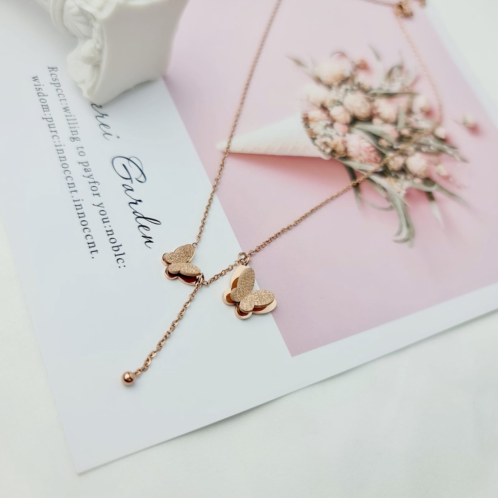 kalung titanium wanita model juntai burrtefly rosegold