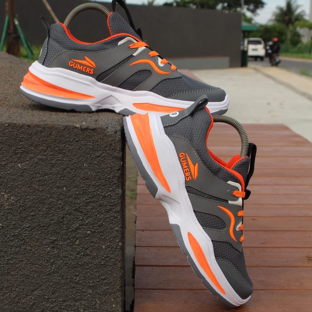 Sneakers Gumers grey orange , Sepatu Pria dan Wanita, sepatu sport, sepatu santai, sepatu olahraga, sepatu kerja, sepatu sekolah, sepatu hitam polos, sepatu enteng. sepatu terbaru, sepatu terlaris, sepatu lari, sepatu senam, sepatu jogging, sepatu running