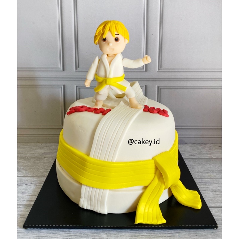 

Kue ulang tahun karakter taekwondo/olahraga (fondant 18cm)