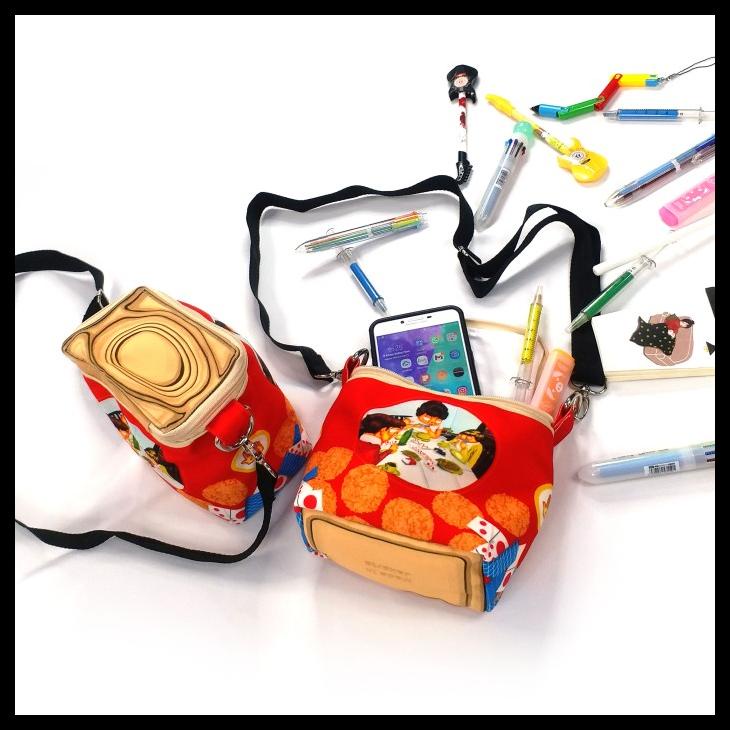 

TAS BAHU SELEMPANG ONDE RENGGINANG PARODI KALENG BISKUIT MINI KECIL