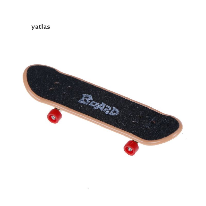 Mini skeatboard tangan