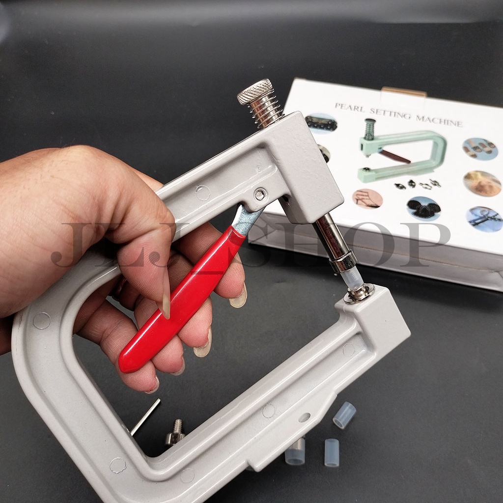 Alat mesin buat pasang atau press mutiara
