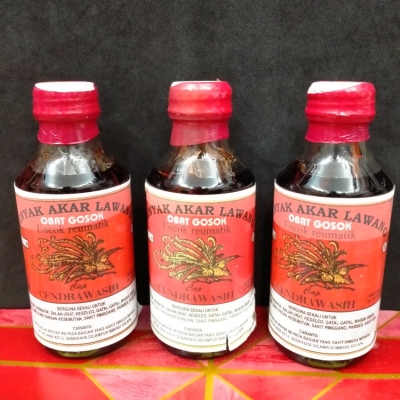 MINYAK URUT AKAR LAWANG OBAT GOSOK ENCOK REMATIK ASLI ORIGINAL