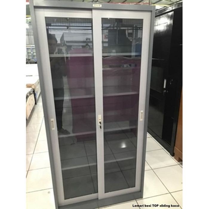 

TERPERCAYA lemari arsip besi kaca pintu sliding merk top by datascipt termurah Code 2844