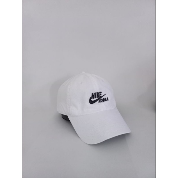 topi nike putih original