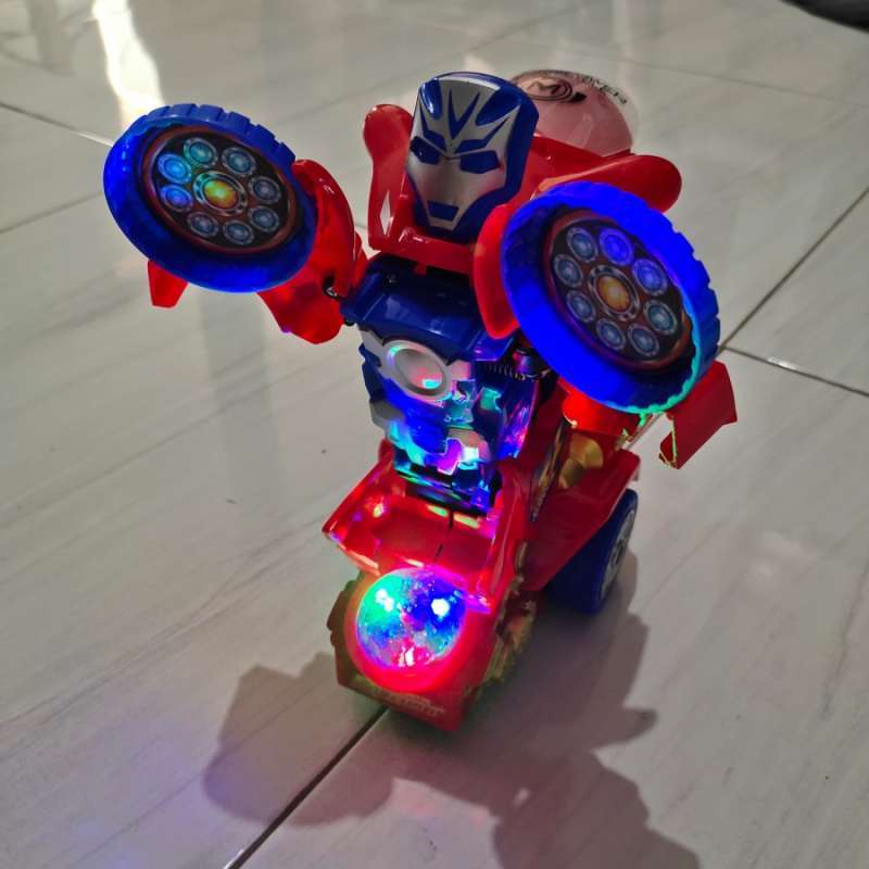 MAINAN ROBOT TRANSPOEWR MOTORCYCLE IROMAN MUSIK &amp; LAMPU