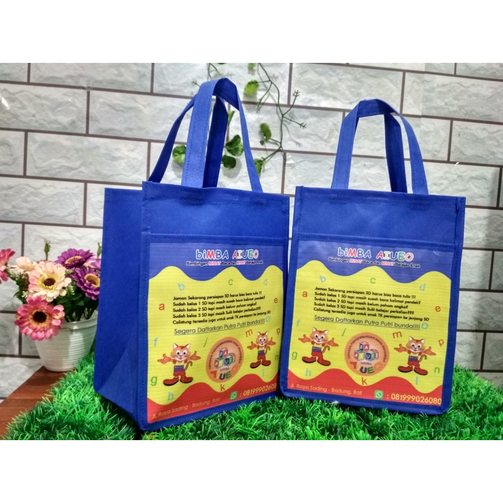 TAS PROMOSI BIMBA AIUEO / TAS BIMBEL FREE DESAIN MODEL KANTONG BANNER