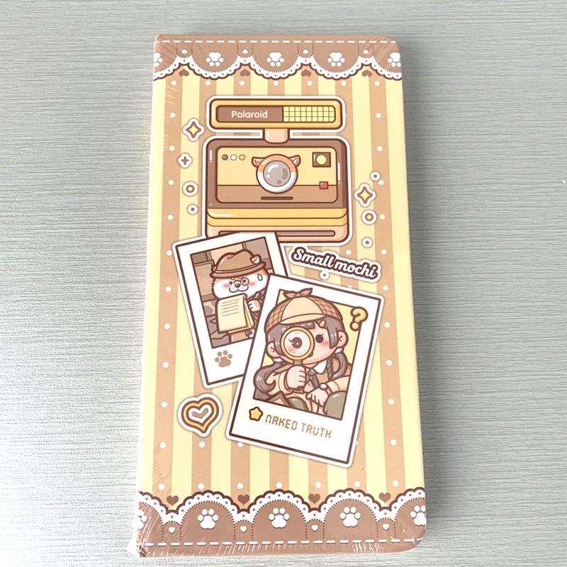 

Small Mochi Yellow Detective Notebook free sticker