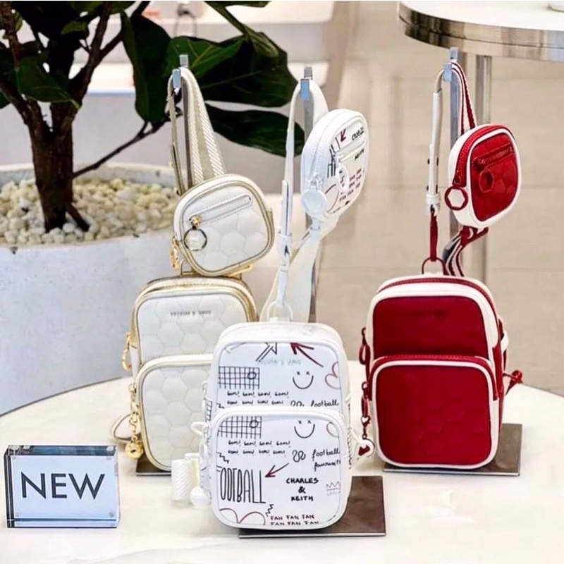 C textured elongated crossbody bag