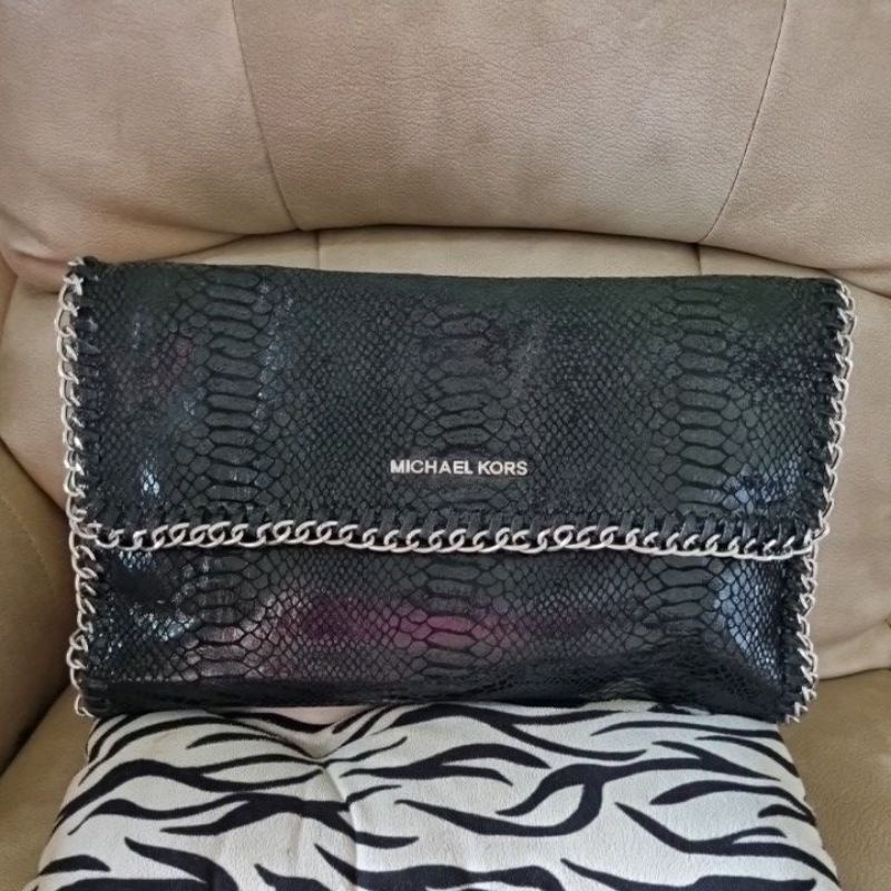 MK clutch /sling preloved