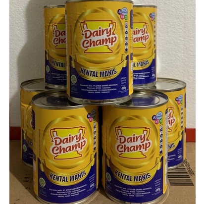 

Susu Dairy Champ 480gr eceran Susu Krimer kental manis