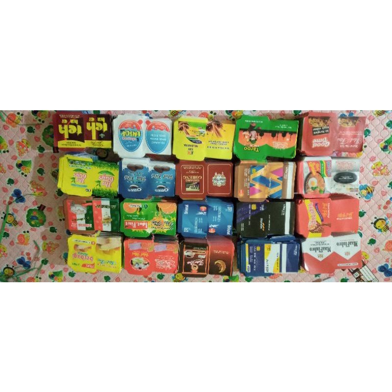 

motif uang,snack,kartun per 50 pak