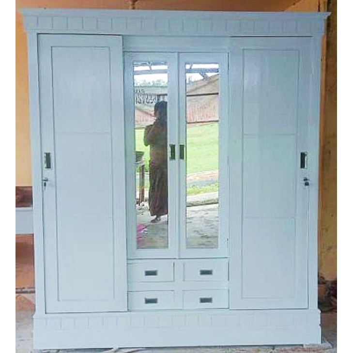 Lemari Sleding bahan kayu jati