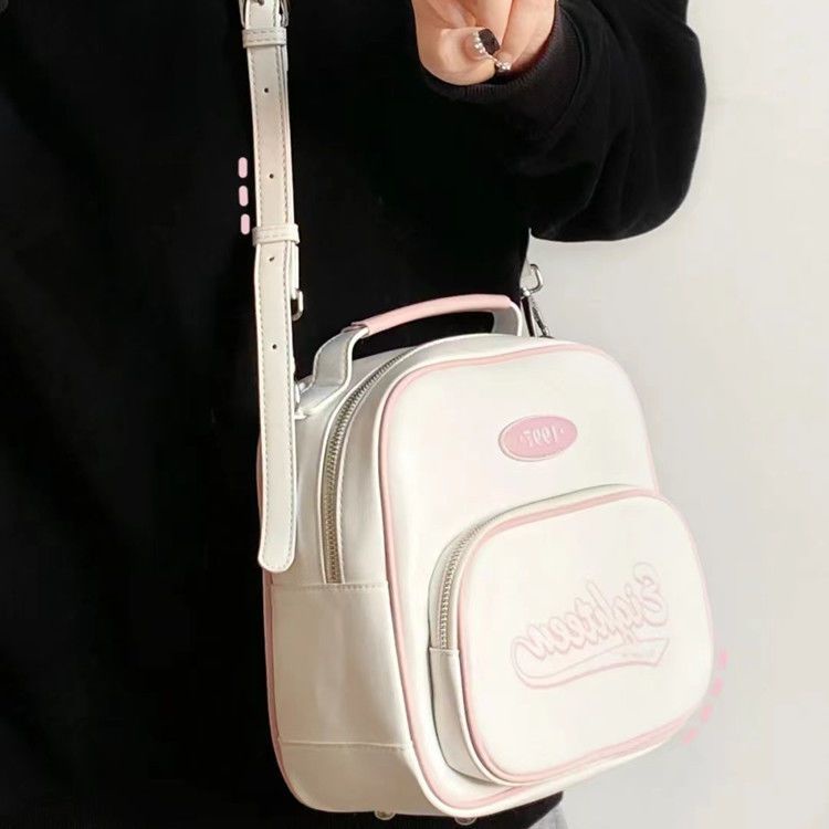 ☎♛☌Sera 2022 tas ransel Messenger satu bahu baru portabel gadis Amerika retro hot komuter tas asli ceruk