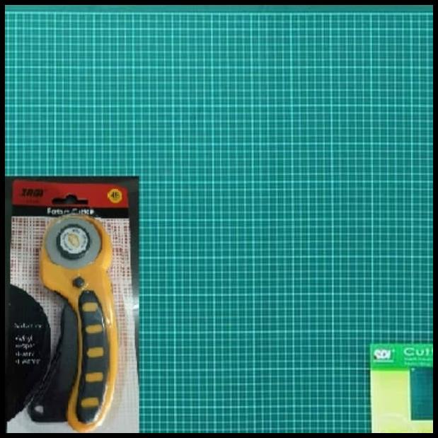 

Paket Cutting Mat A4 + Rotary Cutter Sdi