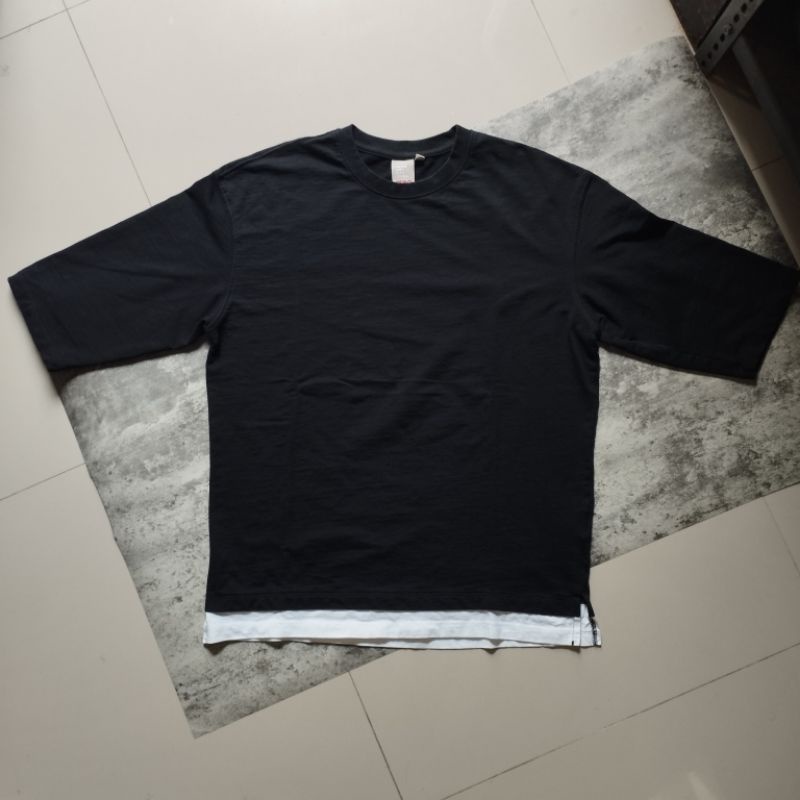 kaos spao hitam