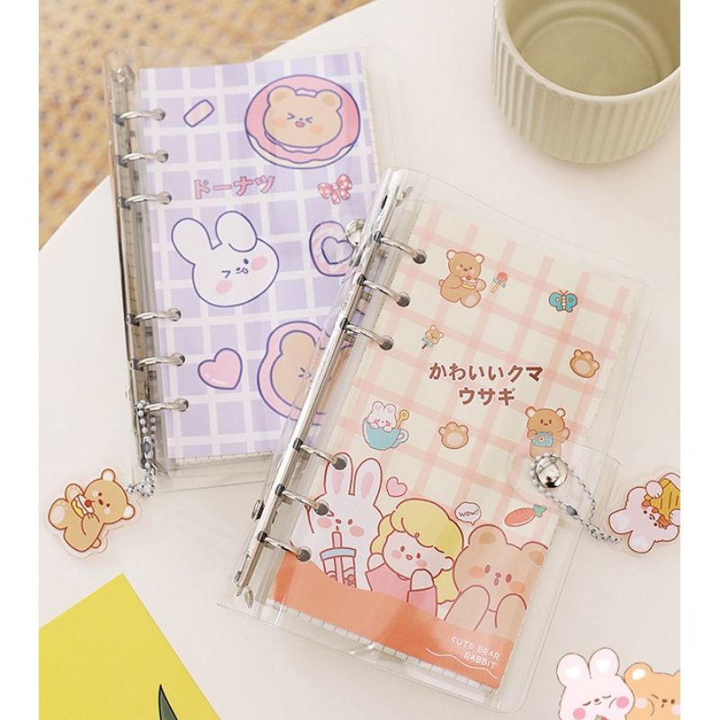 

Binder A6 6 Ring Transparan isi 100 lembar Free Gantungan dan Stiker