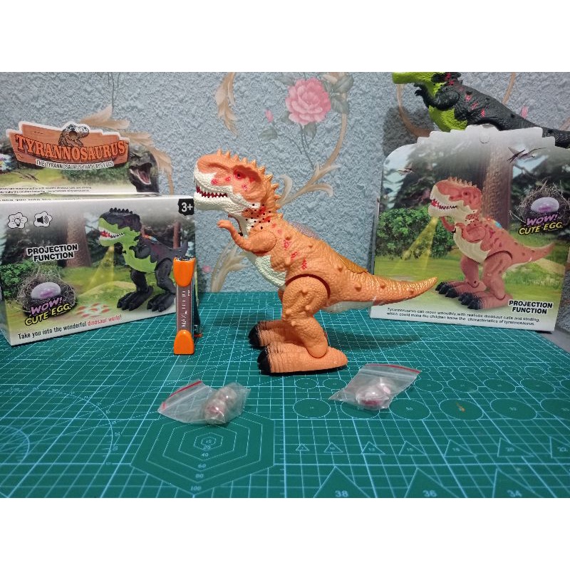 Mainan anak robot dino Tyrannosaurus T-Rex bertelur