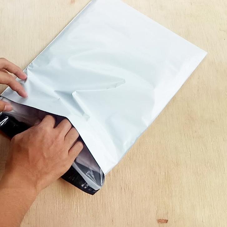 

₨ ISI 100 lembar 25x35 PLASTIK ONLINE SHOP + LEM / POLYMAILER TEBAL (GROSIR) ソ