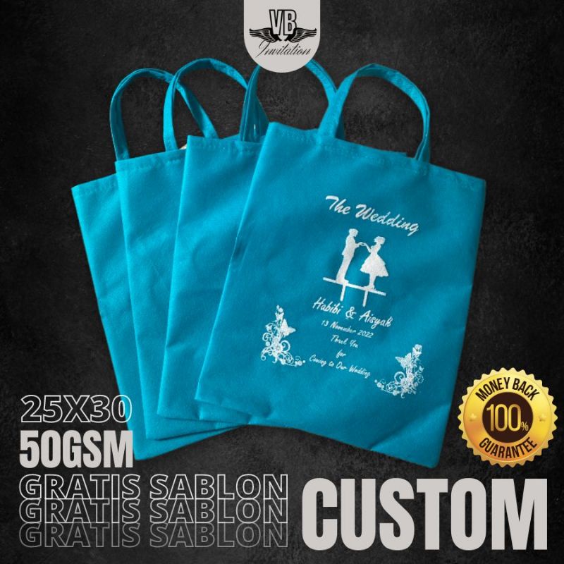 SOUVENIR TAS SPUNBOUND PERNIKAHAN TERBARU TERMURAH SOUVENIR WEDDING FREE SABLON FLAT 25X30