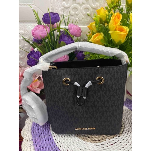 Tas Mk  Suri small bucket crossbody leather ,original