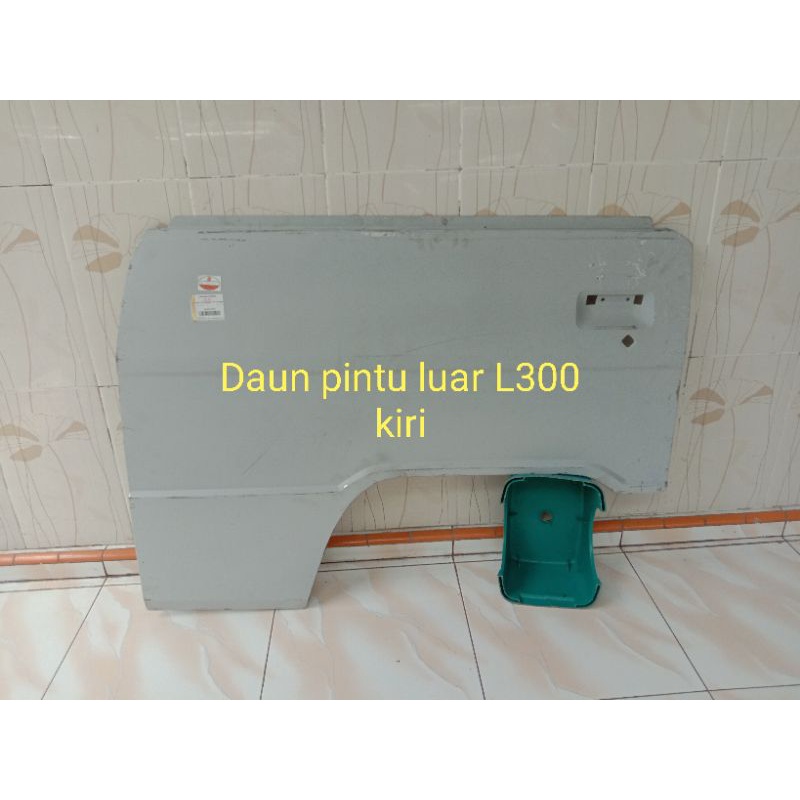 Daun pintu luar kiri L300 original asli ktb