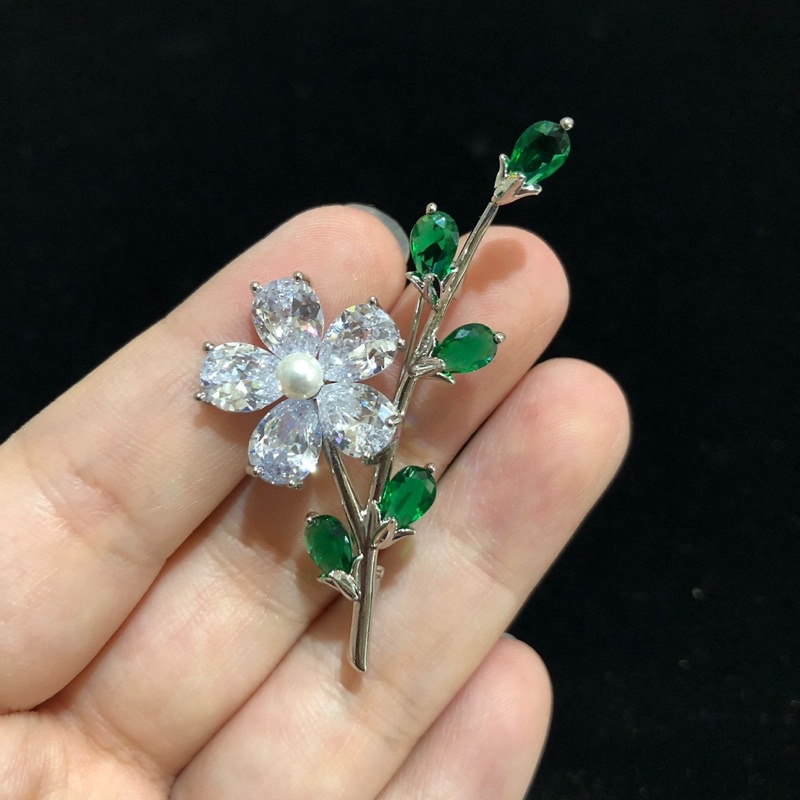 zircon brooch