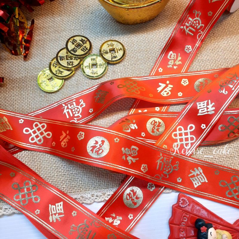 

PITA SATIN MERAH CNY/IMLEK/SINCIA/CHINESE NEW YEAR LEBAR 4 CM, PANJANG 22 METER