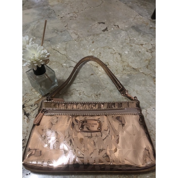 Michael Kors Jet Set Rose Gold Wristlet Preloved