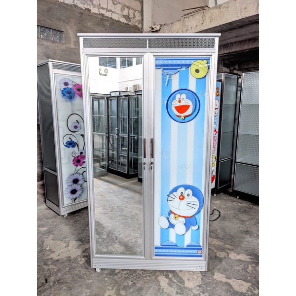Lemari kaca pintu 2 motif karakter