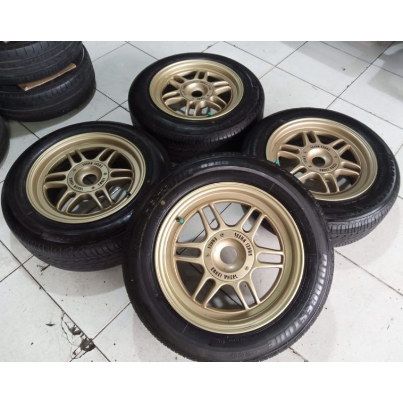 Velg Variasi Pelek Mobil Second Enkei Ring 15 Pcd 4x100/114 + Ban Bridgestone 185 65 R15 Buat Calya 