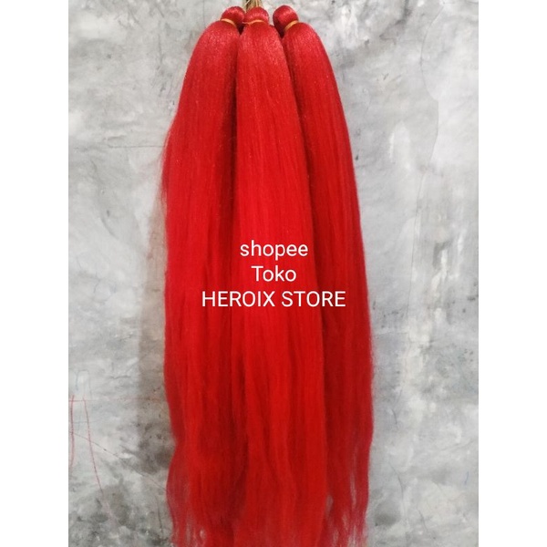 Rambut cemara warna merah cabe