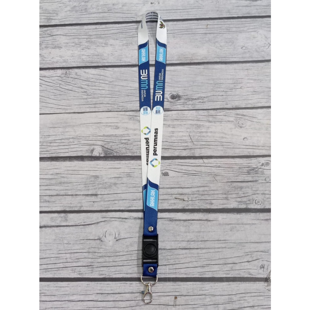 

Lanyard logo Perumnas BUMN Putih Biru Akhlak full printing custom 2sisi merchandise kantor/Lanyard Murah Pandawatali