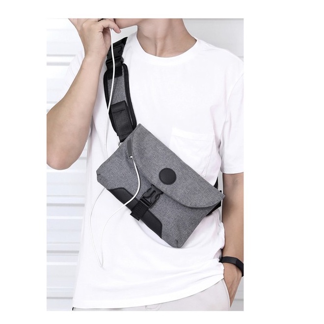 TAS SLING PRIA/WAIST BAG PRIA MODIS DAN BARU AMAN DARI MALING