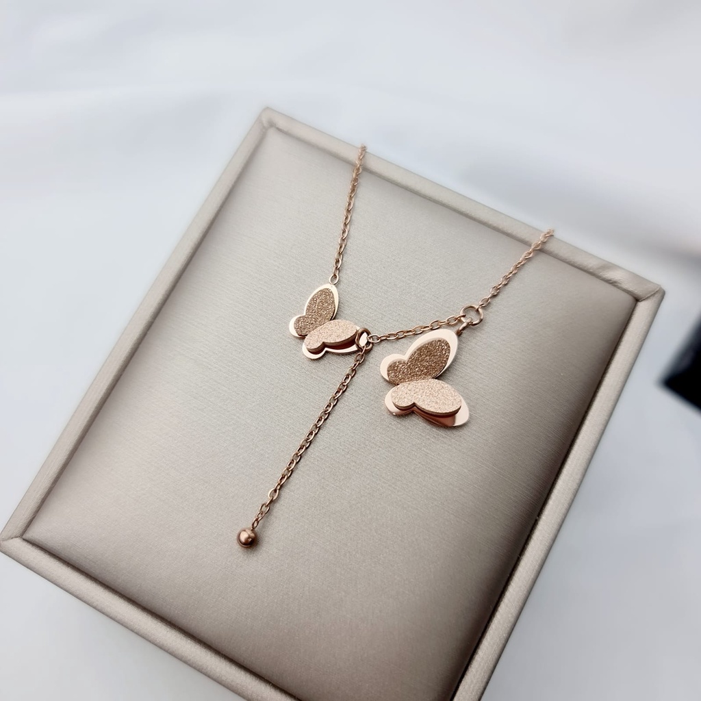 kalung titanium wanita model juntai burrtefly rosegold