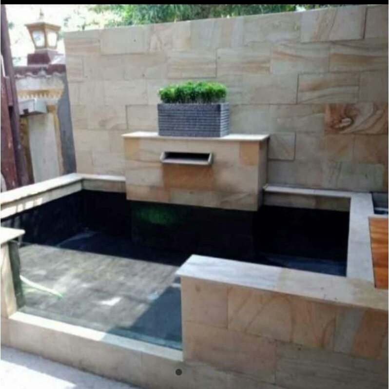 kolam ikan minimalis depan kaca