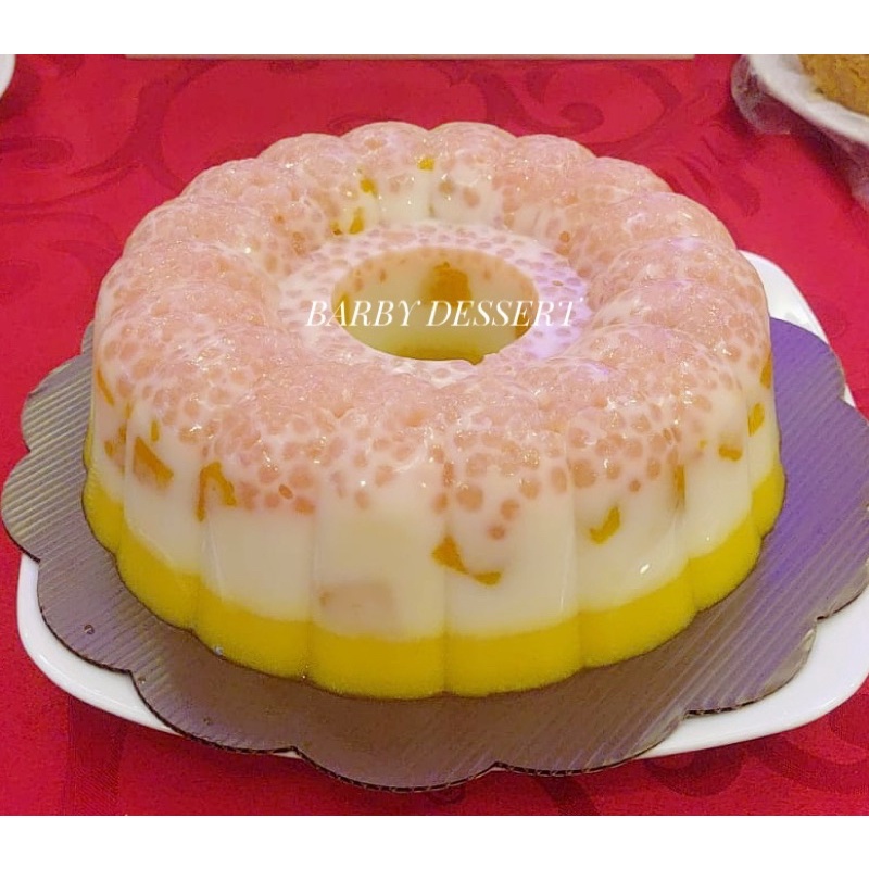

Pudding mango mutiara 22x22CM ada buah mangga nya puding enak hampers natal / birthday / imlek / idul fitri