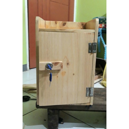 Lemari minimalis kayu jati belanda