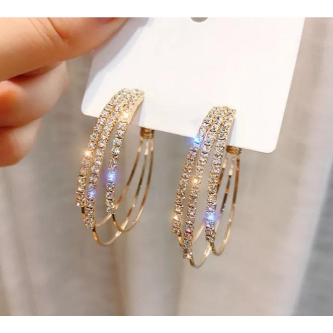 Anting anting kancing geometris
