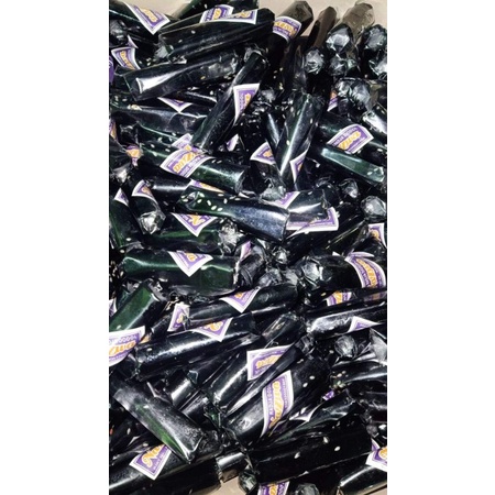 

READY DODOL KETAN HITAM WIJEN BUNGKUS PLASTIK ASLI GARUT DODOL GARUT KETAN HITAM