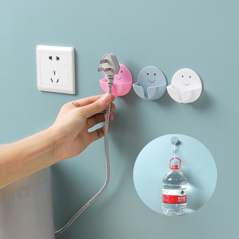 [Grosir] Kait Penyimpanan Colokan Wajah Senyum Kreatif Multifungsi Bebas Paku Seamless Self Adhesive Plug Rak Tetap Kabel Data Charger Colokan Listrik Socket Holder Rak Dinding Rumah