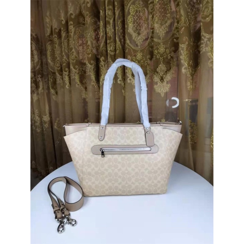 Coach Baby Bag In Signature Canvas (C79958)