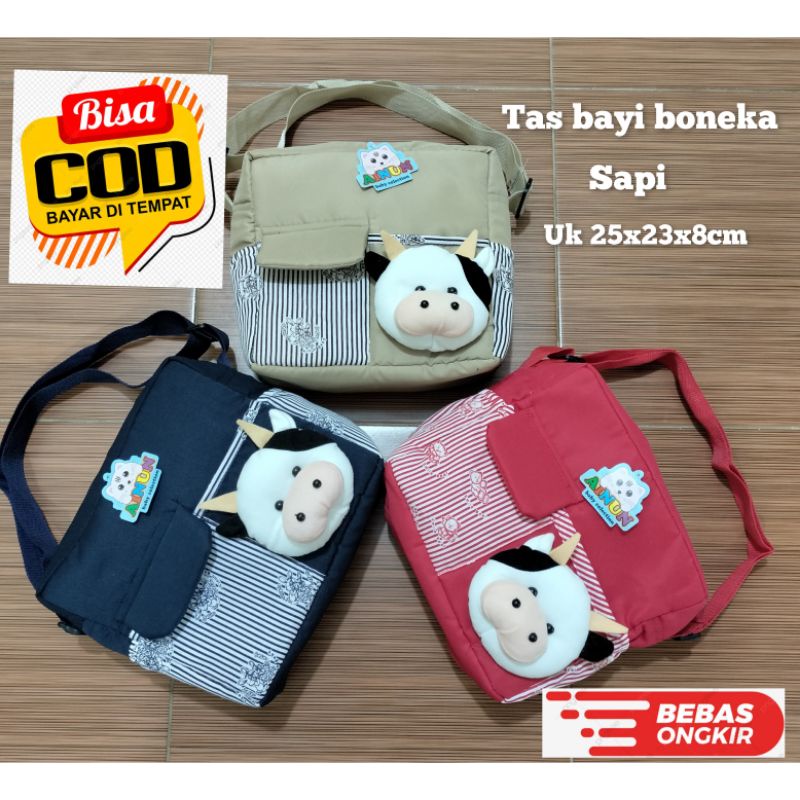 PROMO !!! Tas bayi dengan  saku depan tutup dengan tambahan boneka sapi lucu