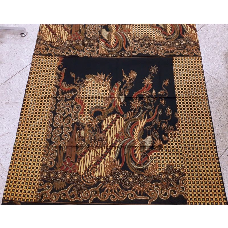 Kain batik solo kombinasi tulis pola merak ukel