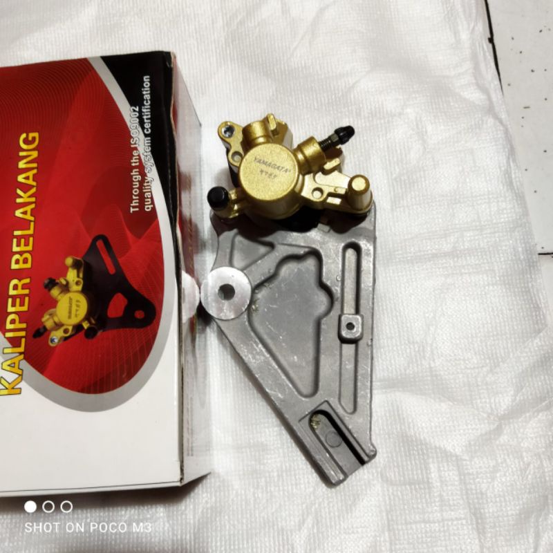 kaliper caliper belakang Supra x 125 double disk non ori